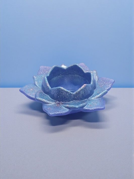 Artymunk3y iridescent lotus flower tealight candle holder with lavender, blue, and teal hues and subtle sparkle.