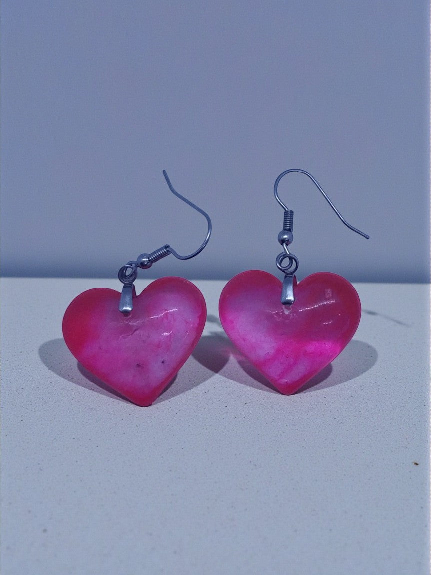 Artymunk3y gradient pink heart dangle earrings with a glossy finish.