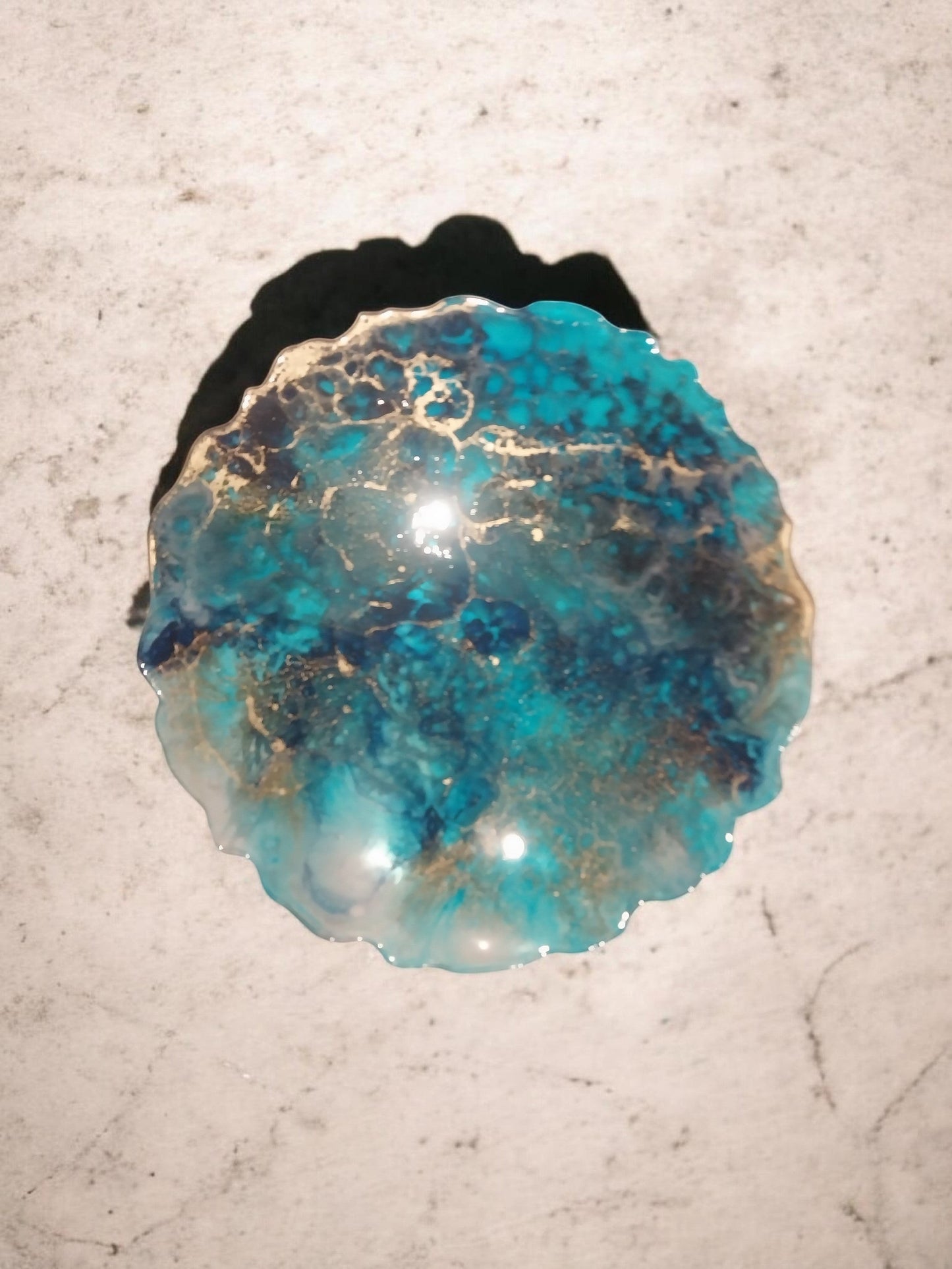 Artymunk3y resin round tray with swirling turquoise, blue, and gold accents. Unique agate-like design.