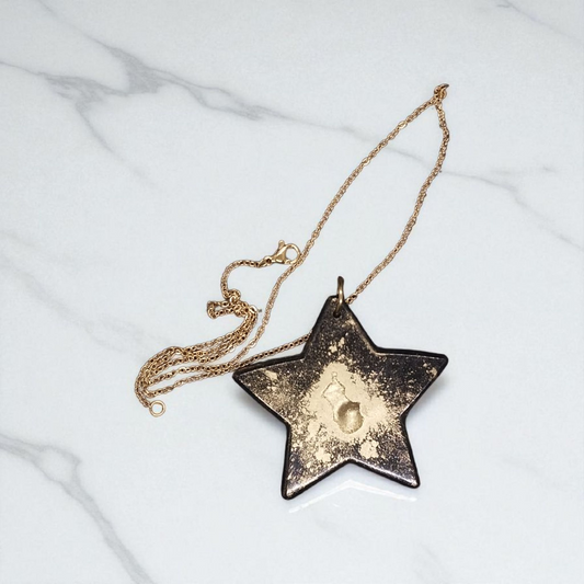 Gold and Black Star Necklace