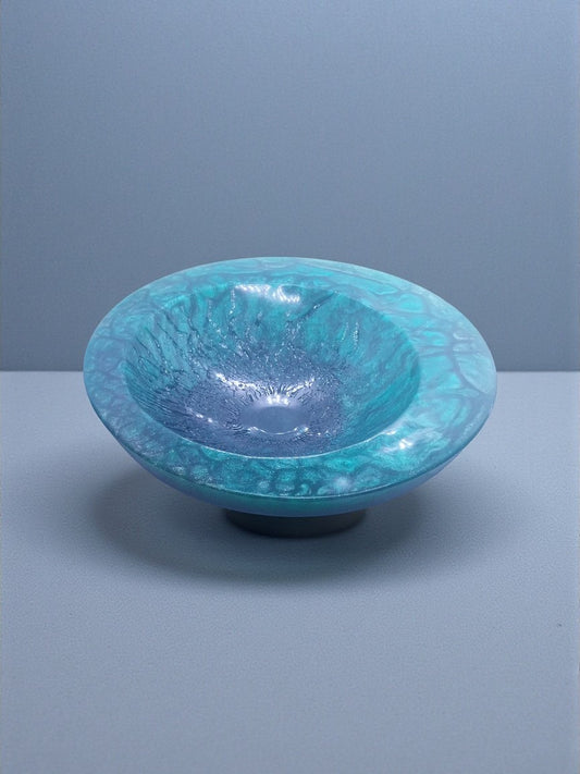 Artymunk3y blue and teal resin decorative bowl with textured exterior and glossy interior.