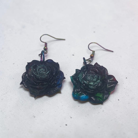 Artymunk3y handcrafted floral rose drop earrings in moody midnight blue, forest green, and violet with iridescent sheen