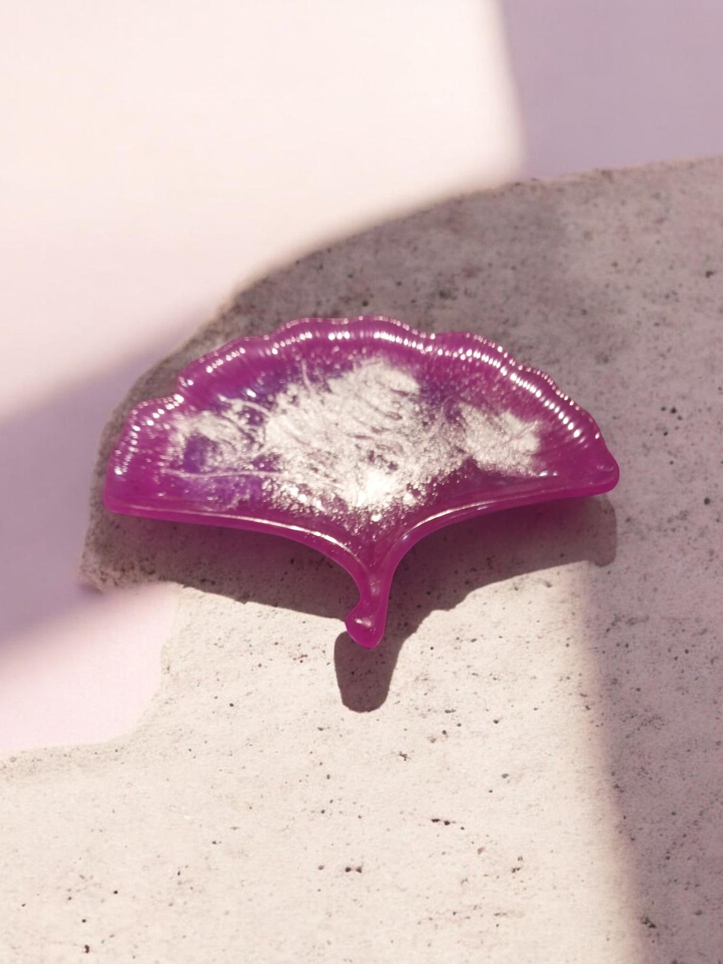 Artymunk3y translucent purple resin trinket dish shaped like a ginkgo leaf with silver flakes.