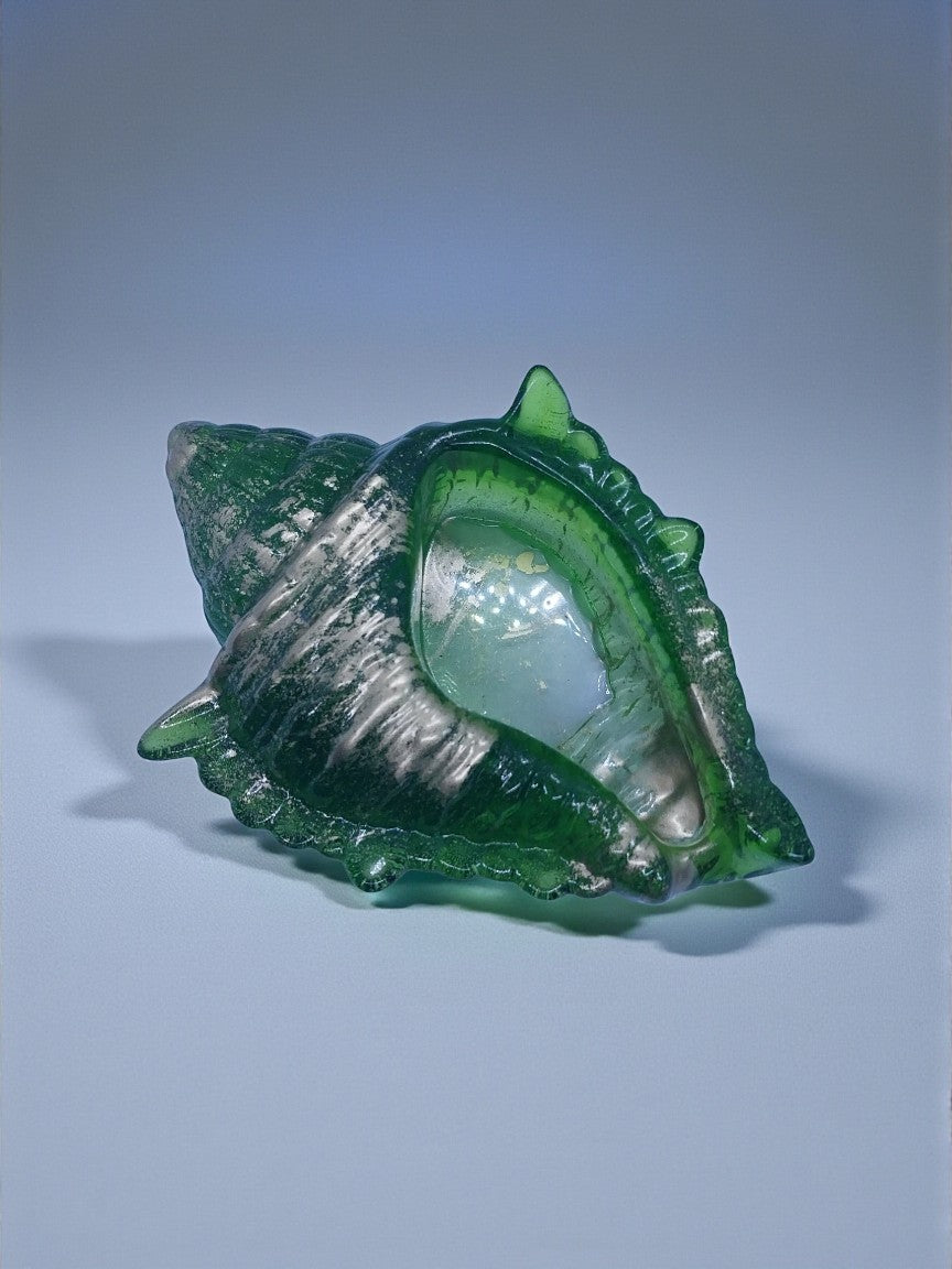 Artymunk3y green glass seashell sculpture ornament with silver accents, detailed texture, coastal decor.