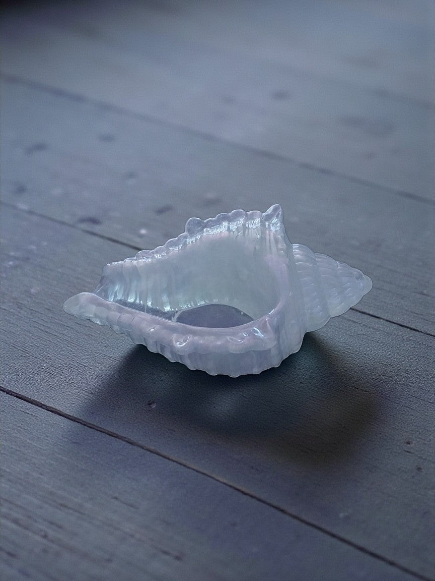 Artymunk3y iridescent glass seashell decorative object with pearlescent sheen, perfect for coastal decor.