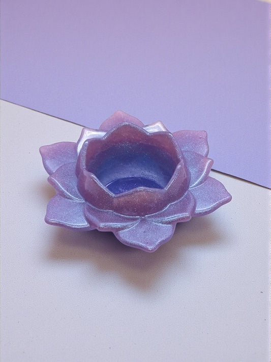 Artymunk3y iridescent lavender and violet lotus flower tealight candle holder made of resin.