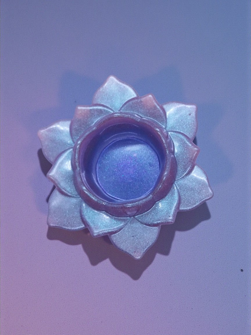 Artymunk3y iridescent lavender and violet lotus flower tealight candle holder made of resin.