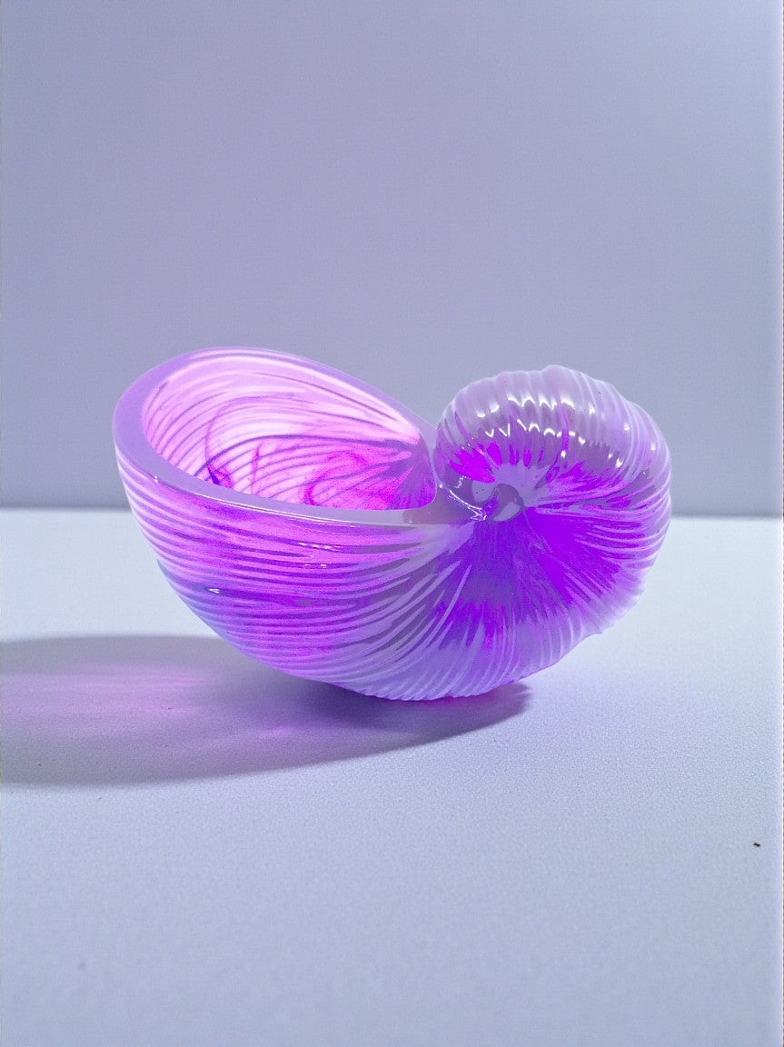 Artymunk3y purple and white swirled acrylic nautilus shell shaped decorative bowl with ridged detail.
