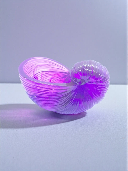 Artymunk3y purple and white swirled acrylic nautilus shell shaped decorative bowl with ridged detail.