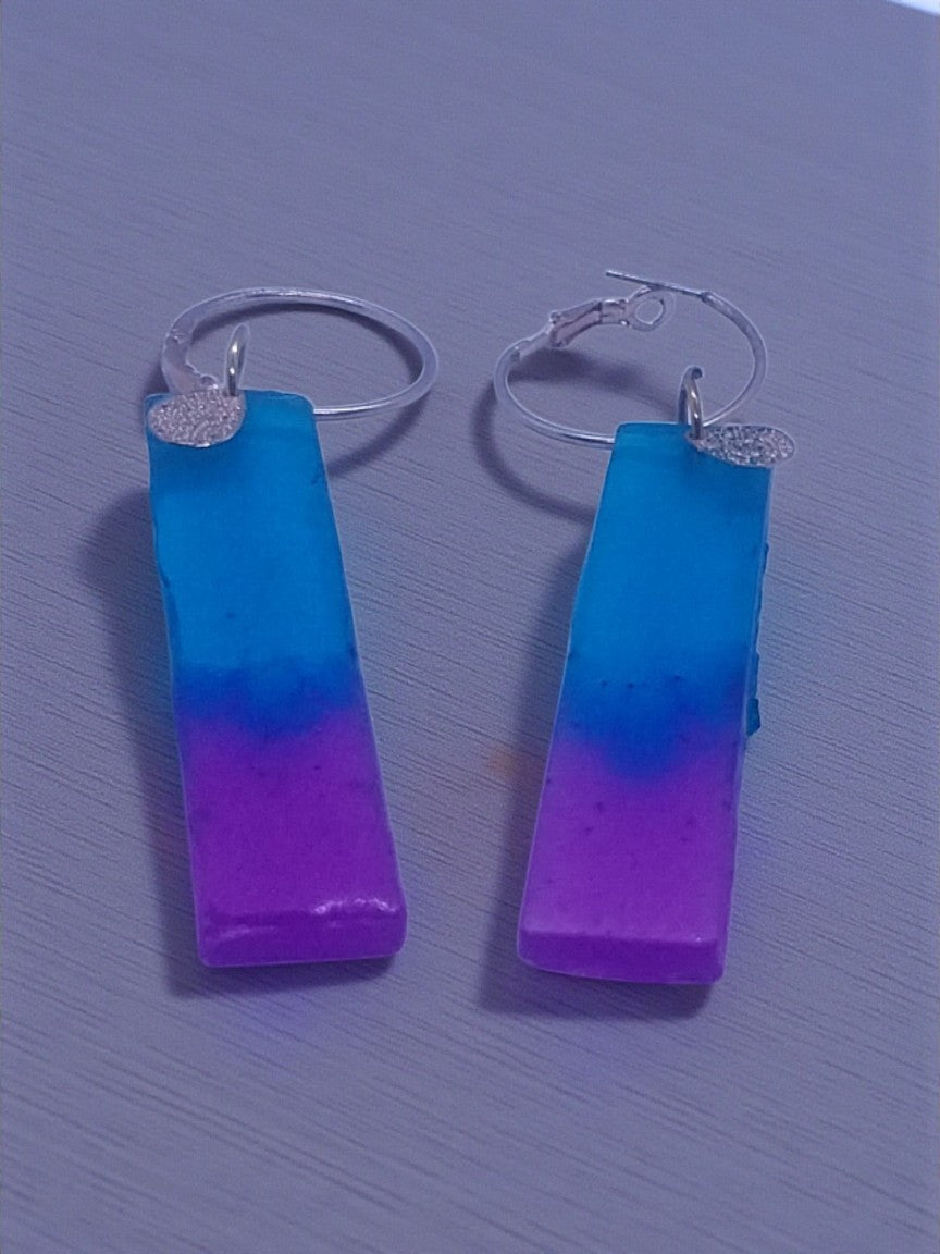 Artymunk3y blue and purple ombre resin bar hoop earrings with silver-tone hoops.