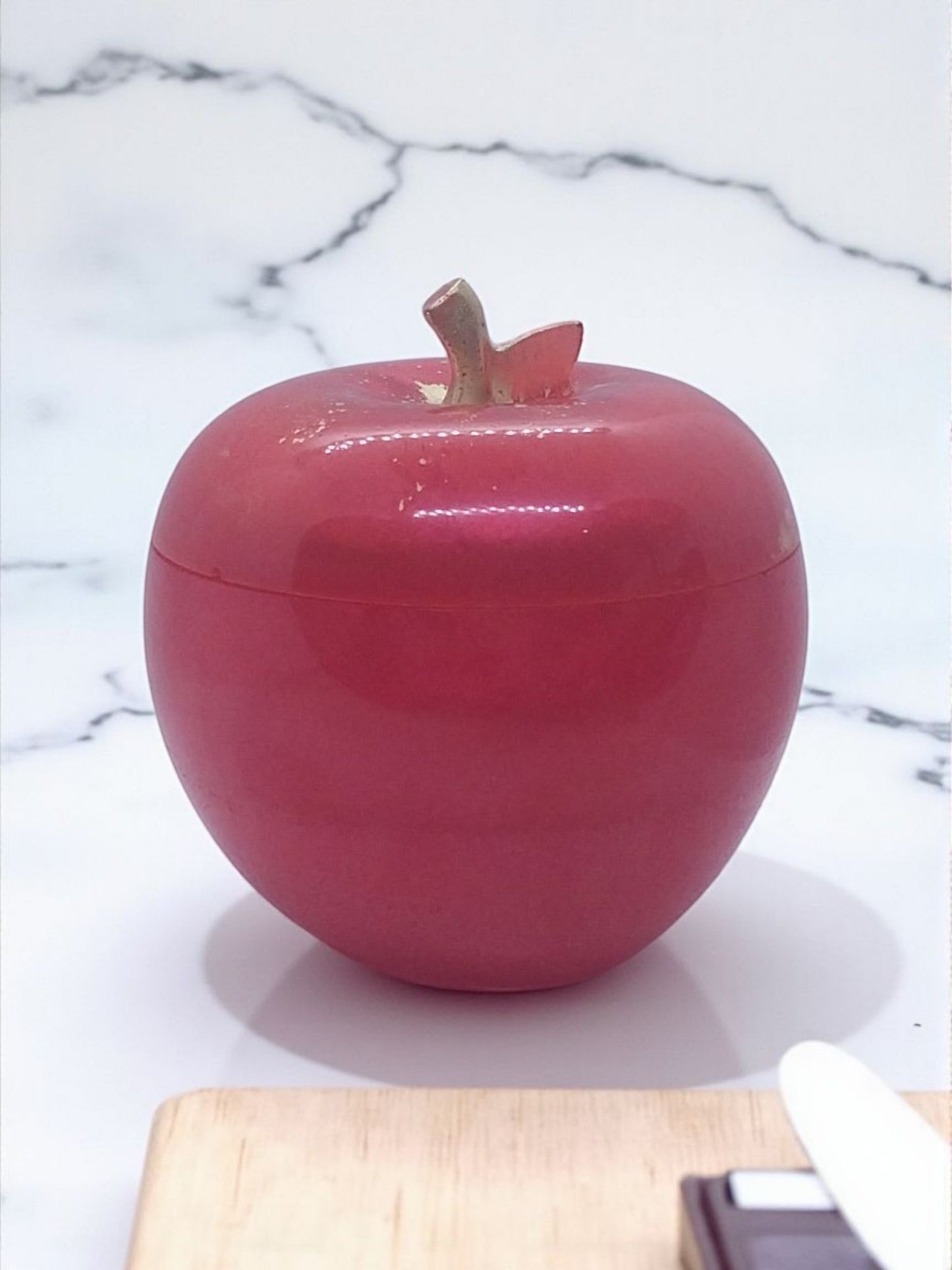 Artymunk3y decorative apple shaped trinket box container, glossy pink resin with gold flecks and stem detail. Perfect for jewelry.