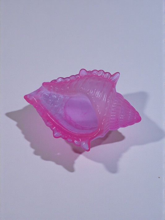 Artymunk3y pink translucent resin seashell trinket dish with swirling colors and organic shape.