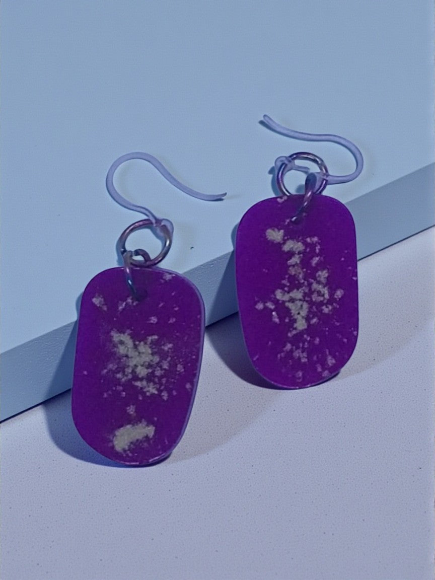 Artymunk3y purple abstract resin dangle earrings with white flecks and hypoallergenic ear wires.