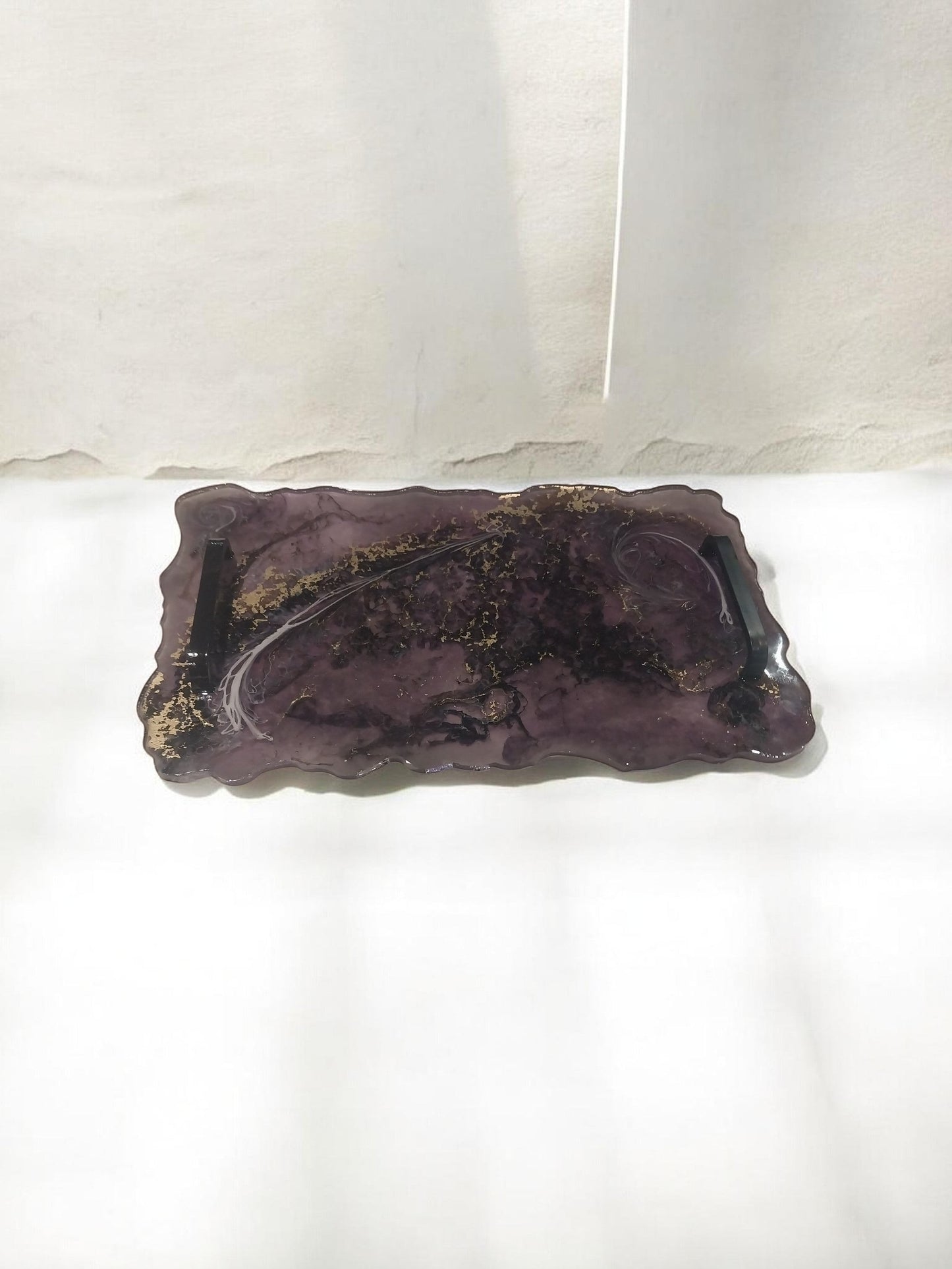 Artymunk3y Decorative resin serving tray with handles, featuring a marbled purple and gold flake pattern and organic edges.