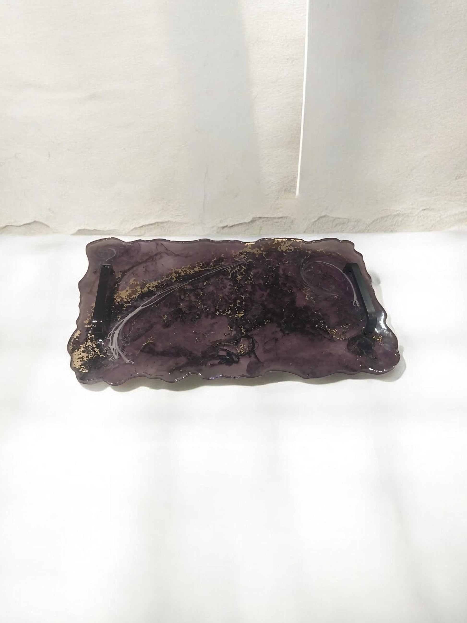 Artymunk3y Decorative resin serving tray with handles, featuring a marbled purple and gold flake pattern and organic edges.
