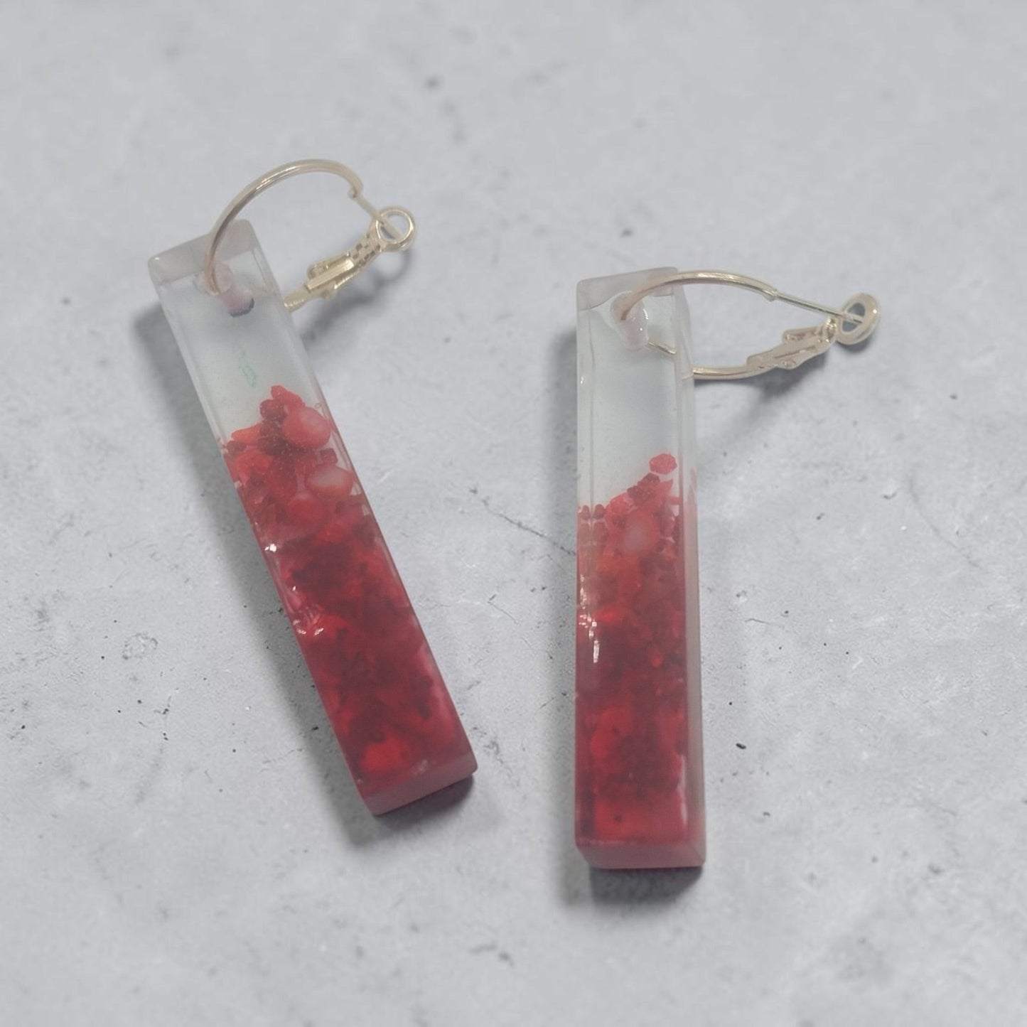Artymunk3y rectangular resin drop earrings with a red gradient effect and gold-tone hoop findings.