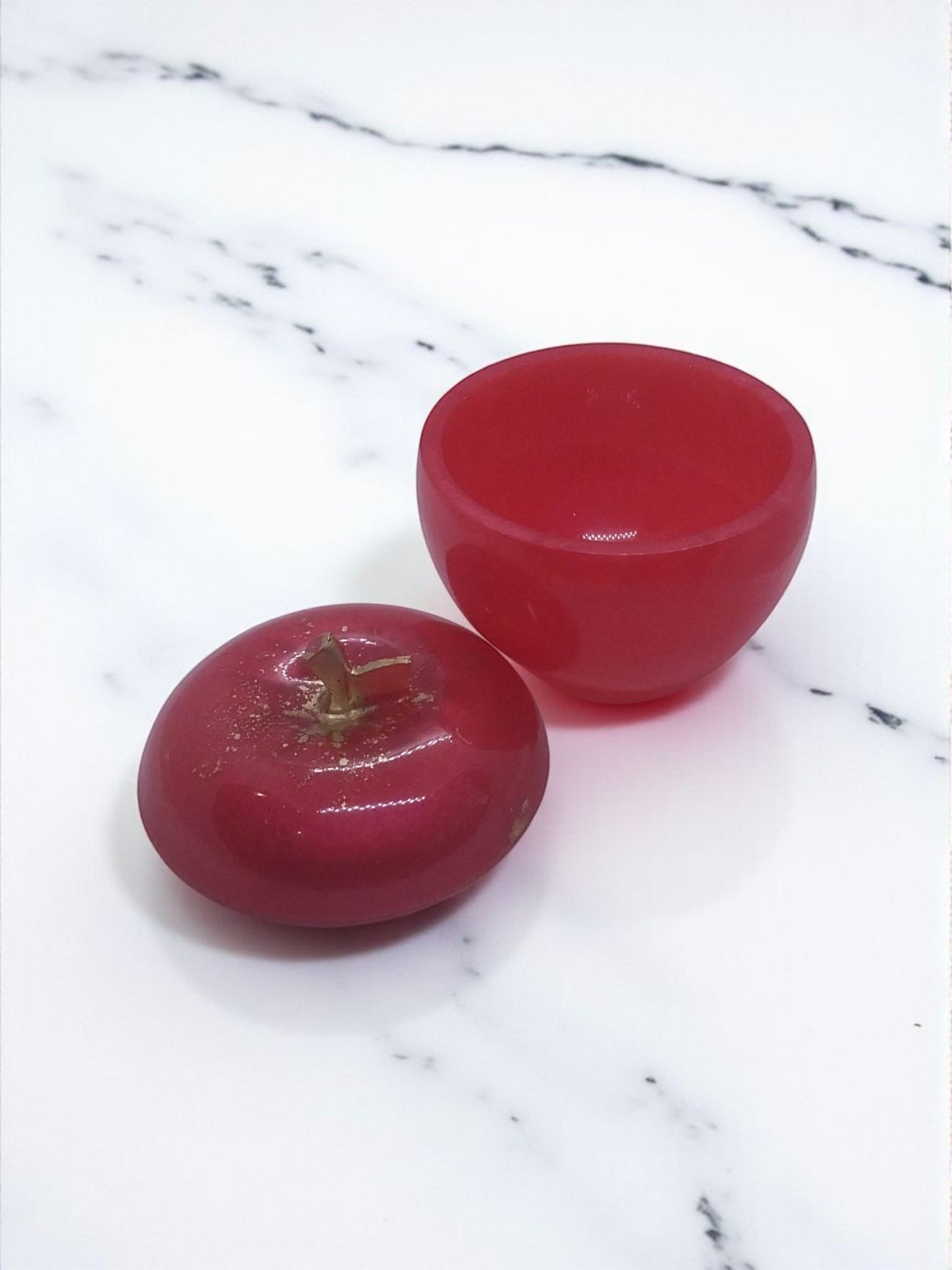 Artymunk3y red apple shaped trinket box container with gold flecks and stem detail. Hinged lid for secure storage.