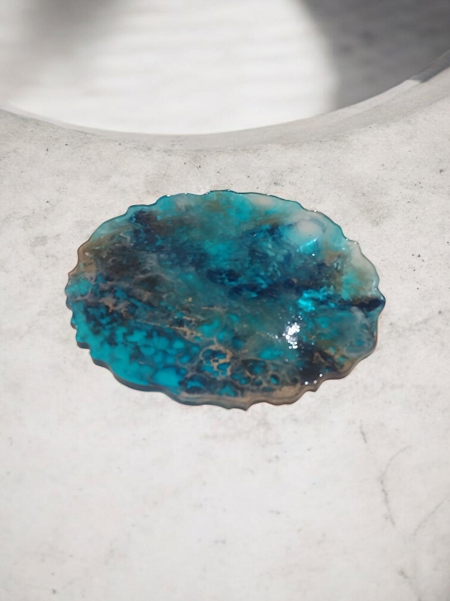 Artymunk3y resin round tray with swirling turquoise, blue, and gold agate-like patterns. Glossy finish.