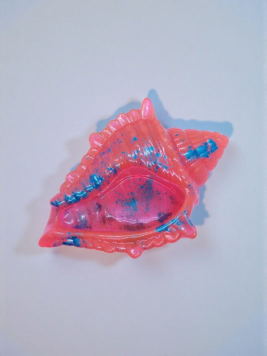 Artymunk3y coral pink resin seashell trinket dish with blue splatter accents. Ideal for jewelry or keys.