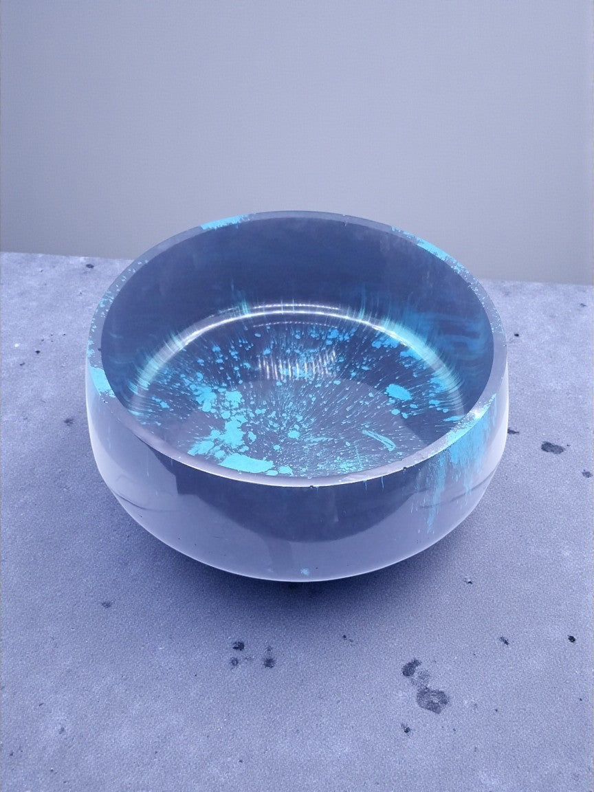 Artymunk3y decorative bowl with blue splatter pattern on dark base, made of resin.