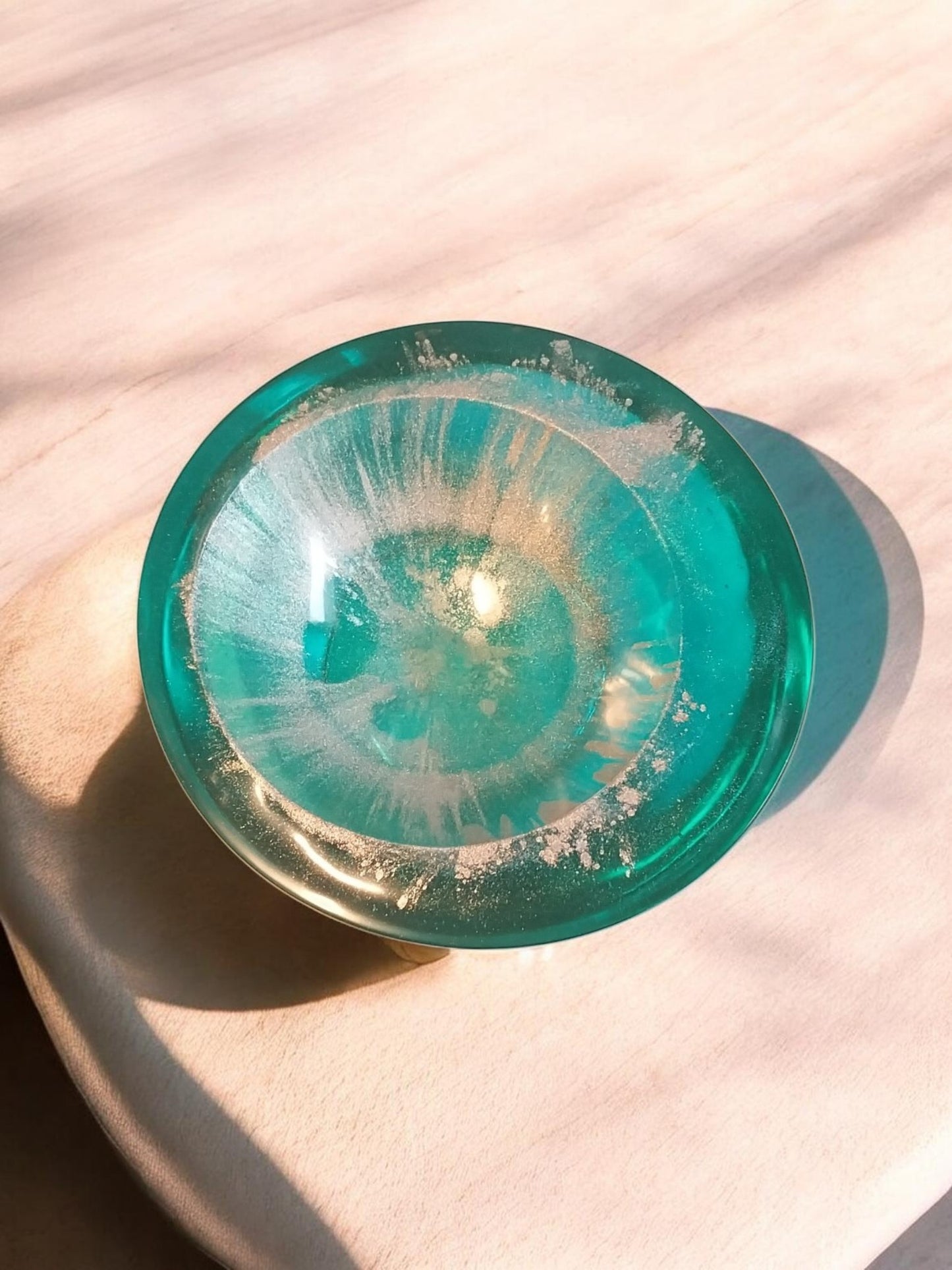 Artymunk3y decorative resin trinket dish in translucent teal with white and gold swirls. Perfect for jewelry or keys.