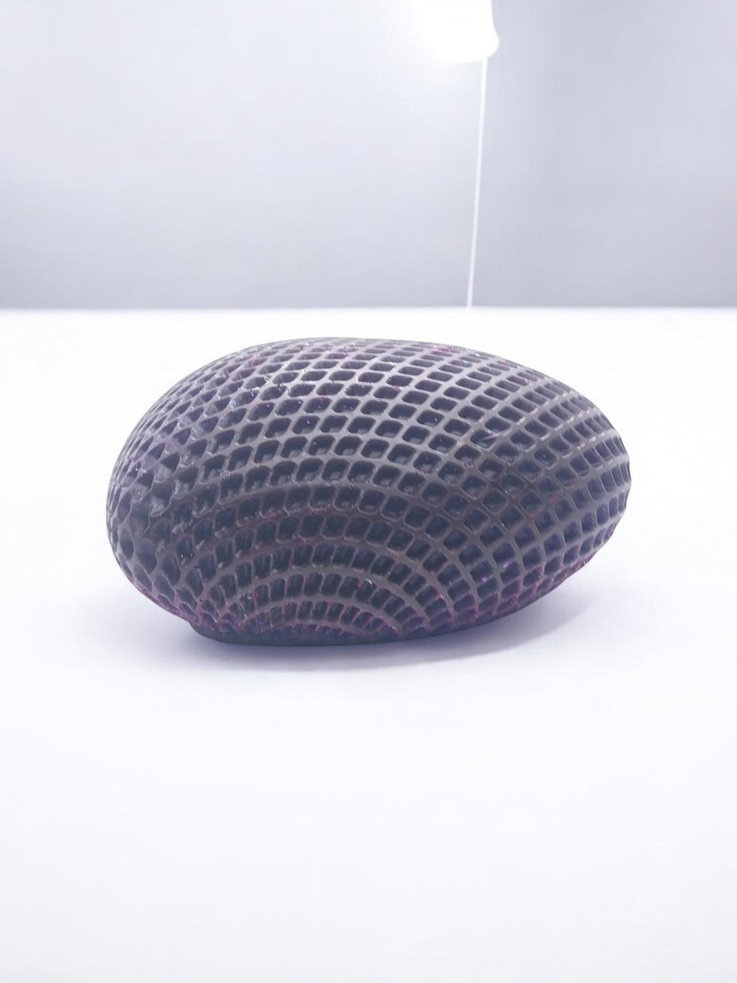 Artymunk3y dark purple textured heart-shaped decorative object with geometric pattern.