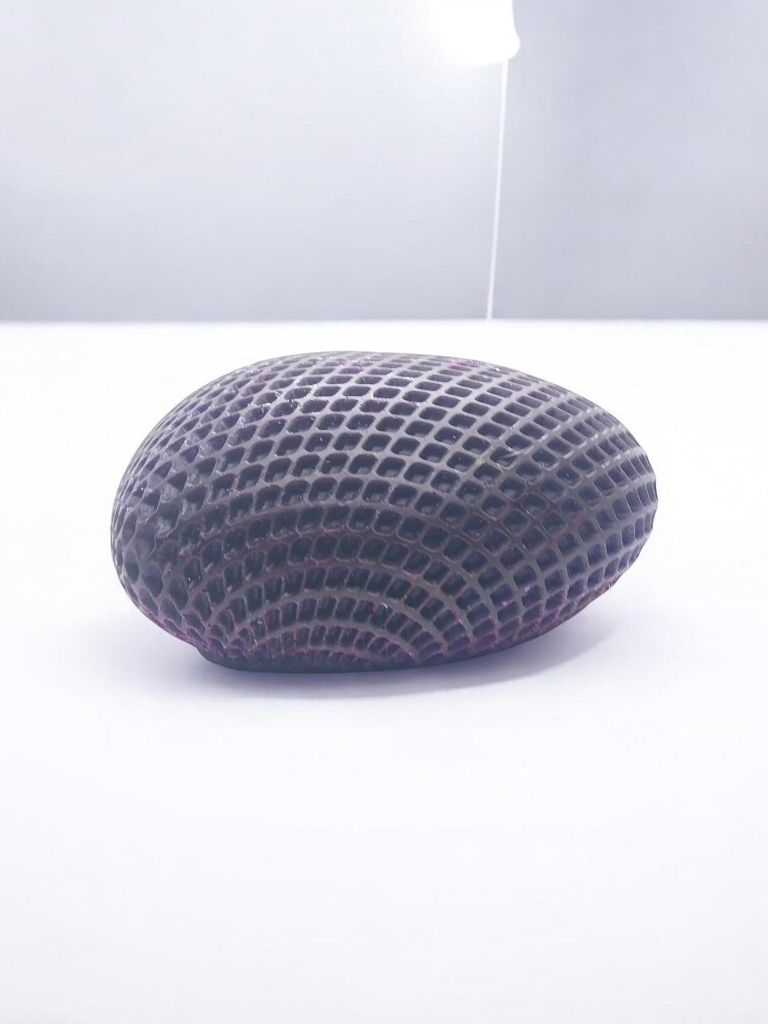 Artymunk3y dark purple textured heart-shaped decorative object with geometric pattern.