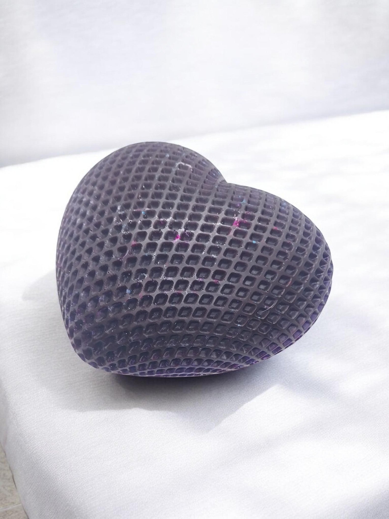 Artymunk3y dark purple textured heart-shaped decorative object with geometric pattern and subtle glitter flecks.