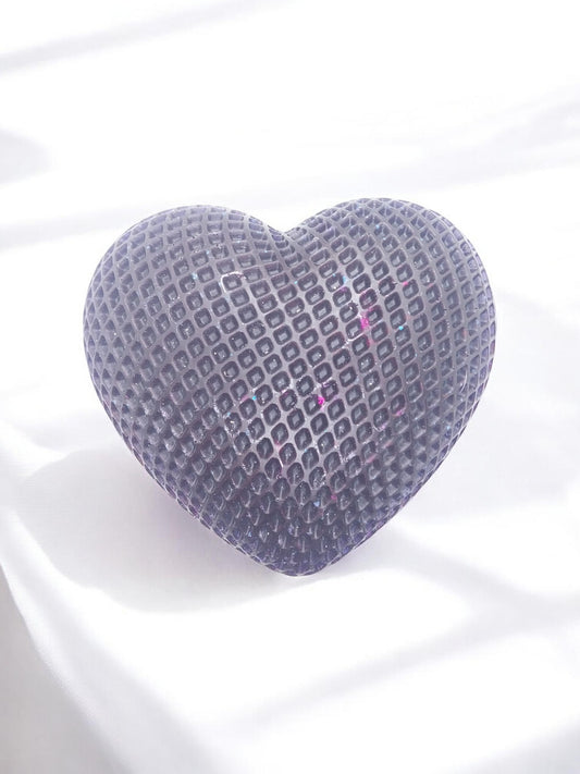 Artymunk3y dark purple textured heart-shaped decorative object with geometric pattern and subtle glitter accents.