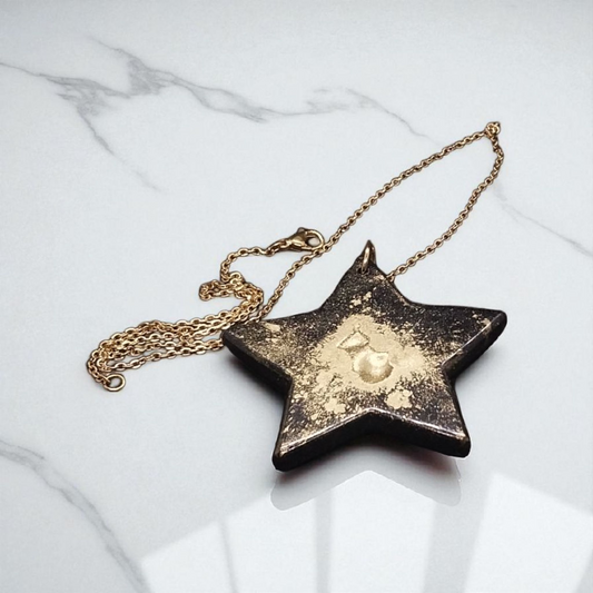Gold and Black Star Necklace